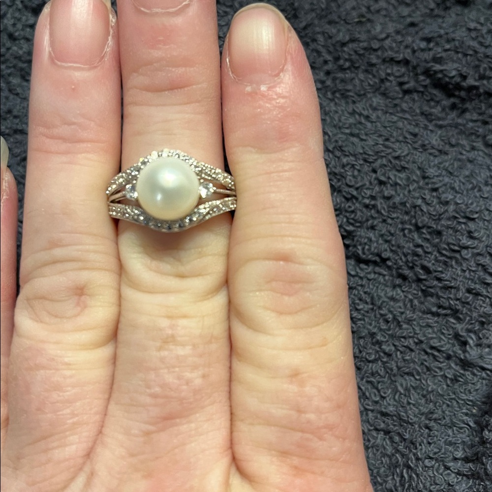 Pearl and clear stone ring